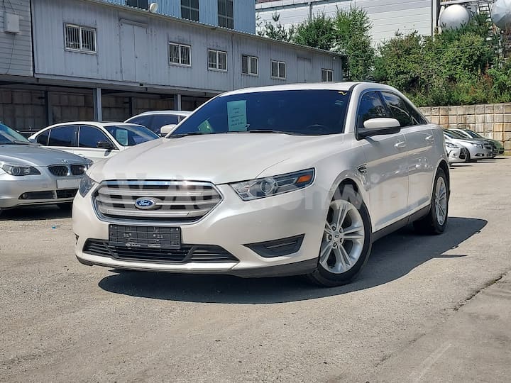 2015 Ford New Taurus — VIN 1FAHP2E97FG111703