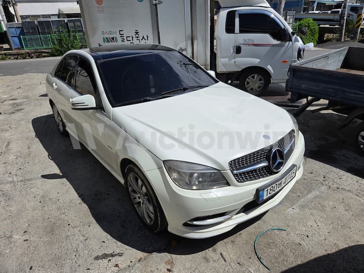 2010 Mercedes Benz C Class — VIN WDDGF4JBXAA404154